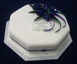 White and blue engagement cake