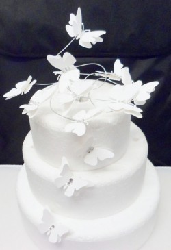 White wedding cake with butterflies