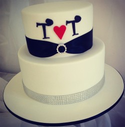 2 tier white engagement cake