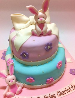 2 tier birthday’s cake with bunnies