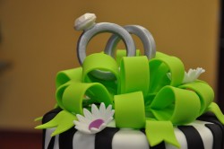 Engagement cake with green ribbon