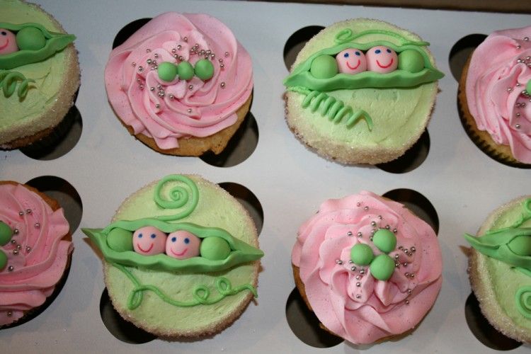 Baby shower cupcakes with child peas
