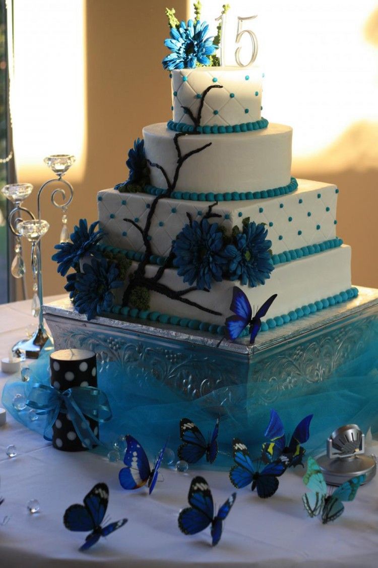 Blue quinceanera cake with butterflies