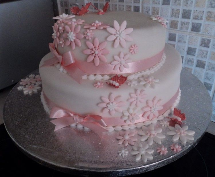 Christening cake with pink flowers