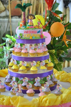 Dora birthday cake with cupcakes