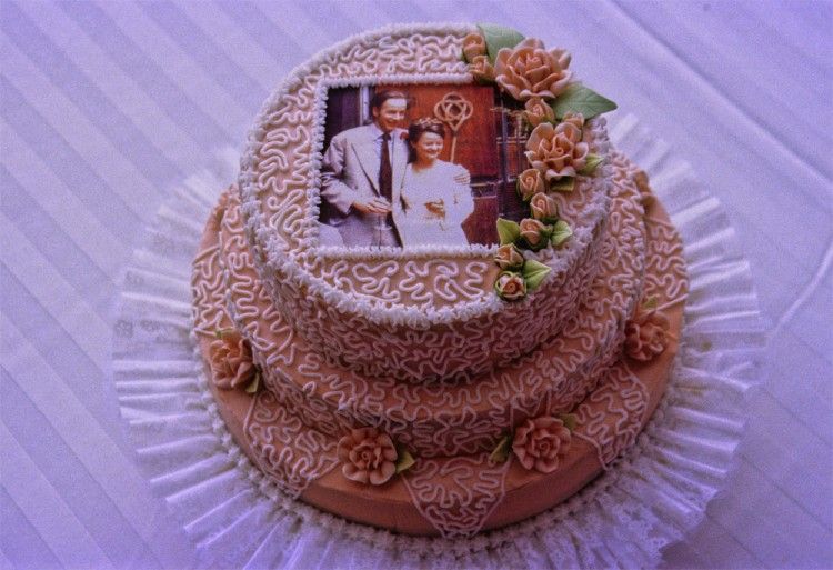 Pink anniversary cake with photo