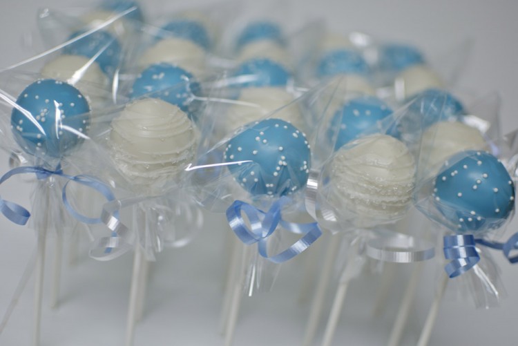 White and blue christening cake pops