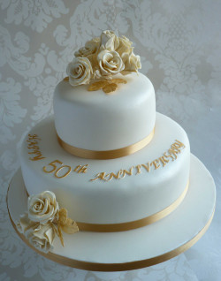 Anniversary cake with yellow flowers