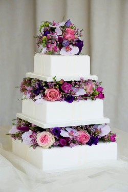 Wedding cake with fresh flowers