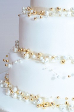 Wedding cake with gold beads