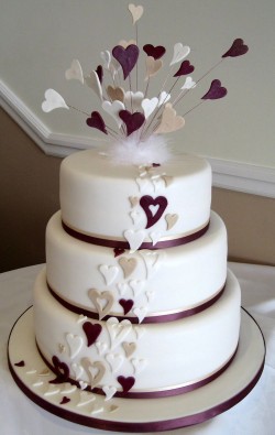 Wedding cake with purple hearts