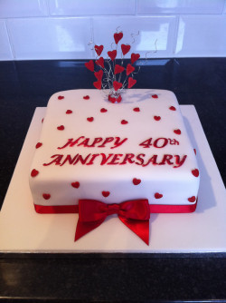 Anniversary cake with red hearts