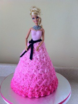 Pink swirl Barbie birthday cake