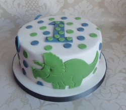 Dinosaur cake with dots